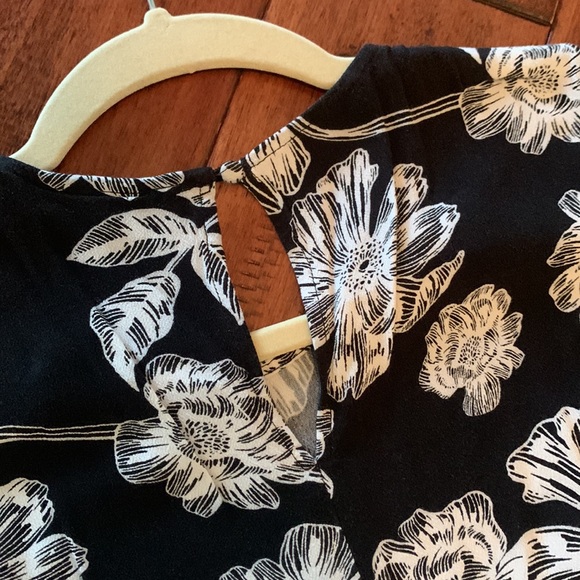 Black and white floral, wrap dress with ruffle detail. - Picture 9 of 9